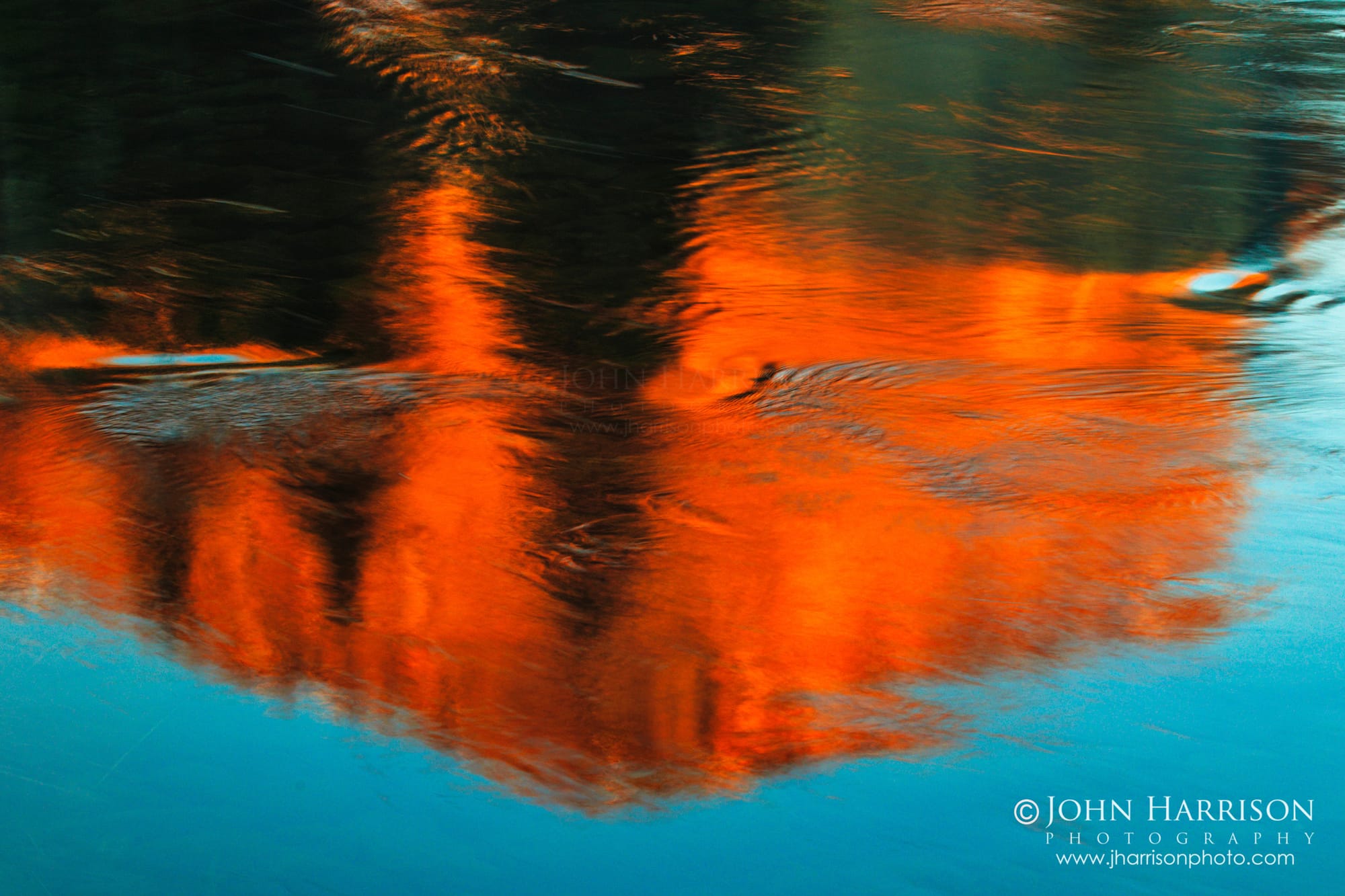 Fine Art Print of an Abstract reflection of El Capitan at sunset in the Merced River with gold and blue tones, Yosemite National Park