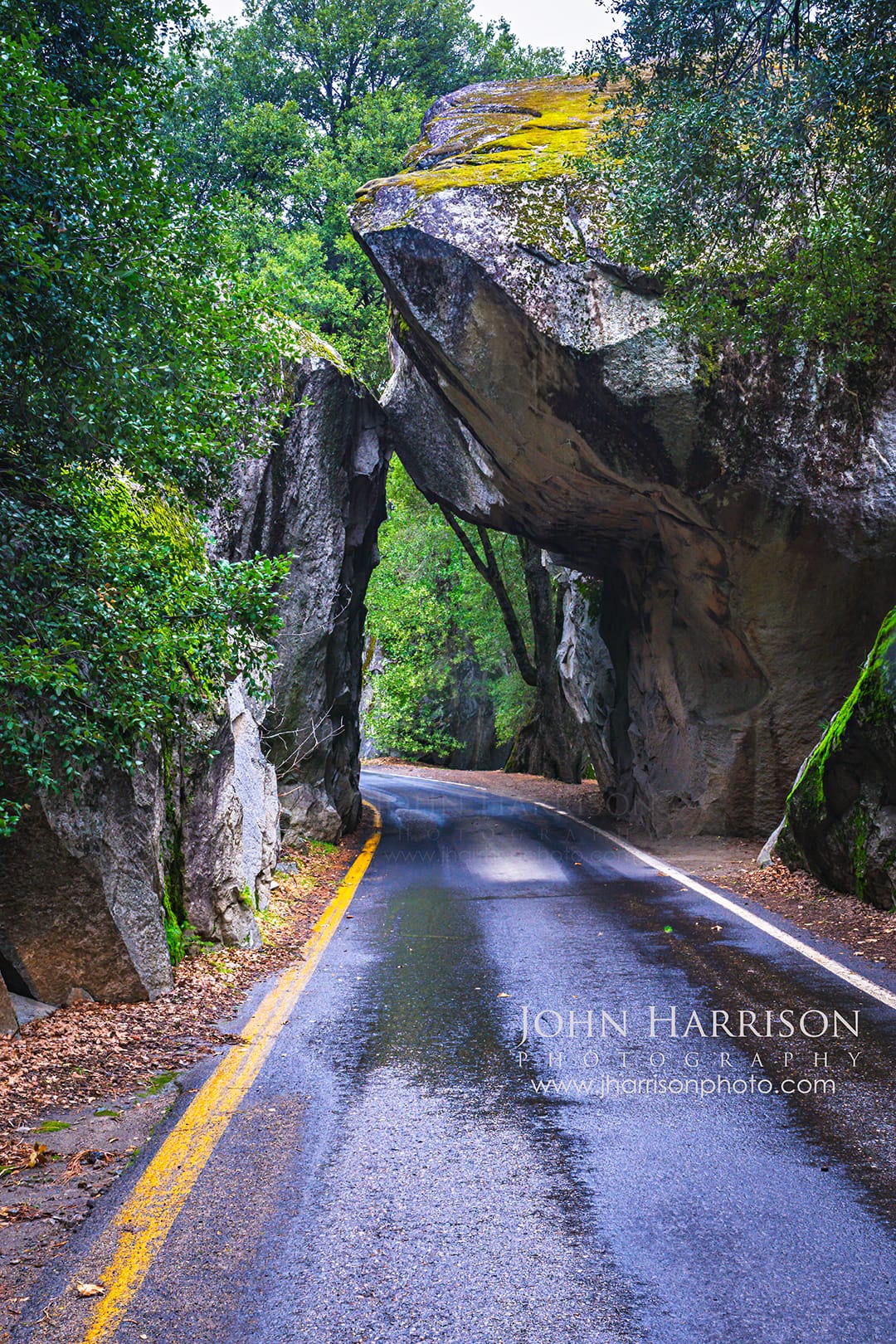 Yosemite Arch Rock Entrance along Highway 140, the granite gateway road into Yosemite National Park from the Merced River canyon.